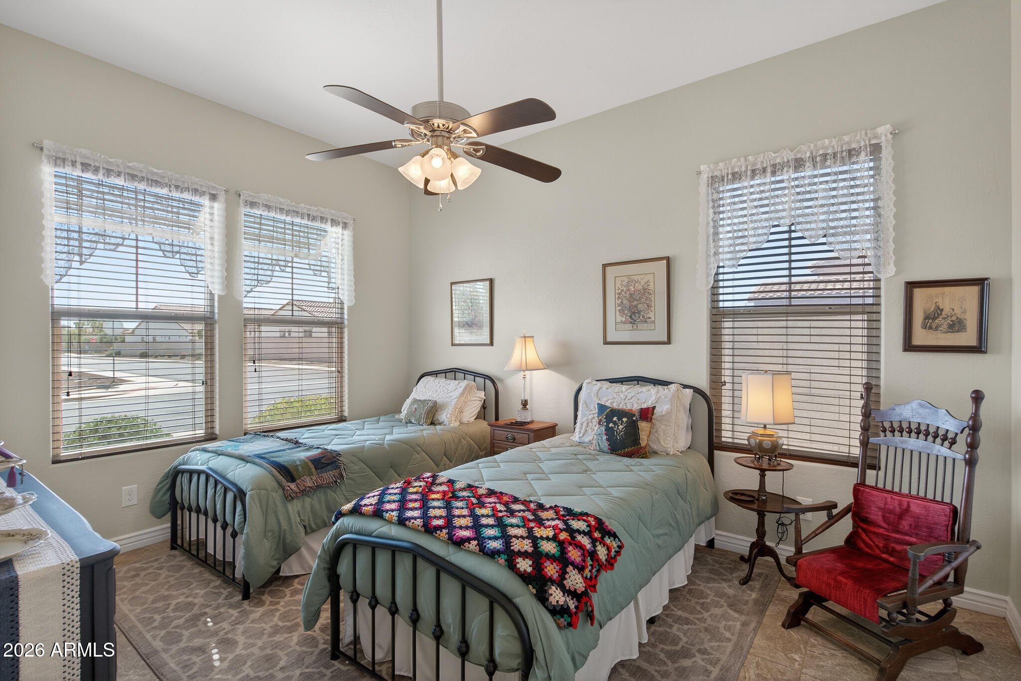 18398 West Rimrock Street Surprise, AZ 85388 - Photo 26 of 65 a bedroom with two beds and a window