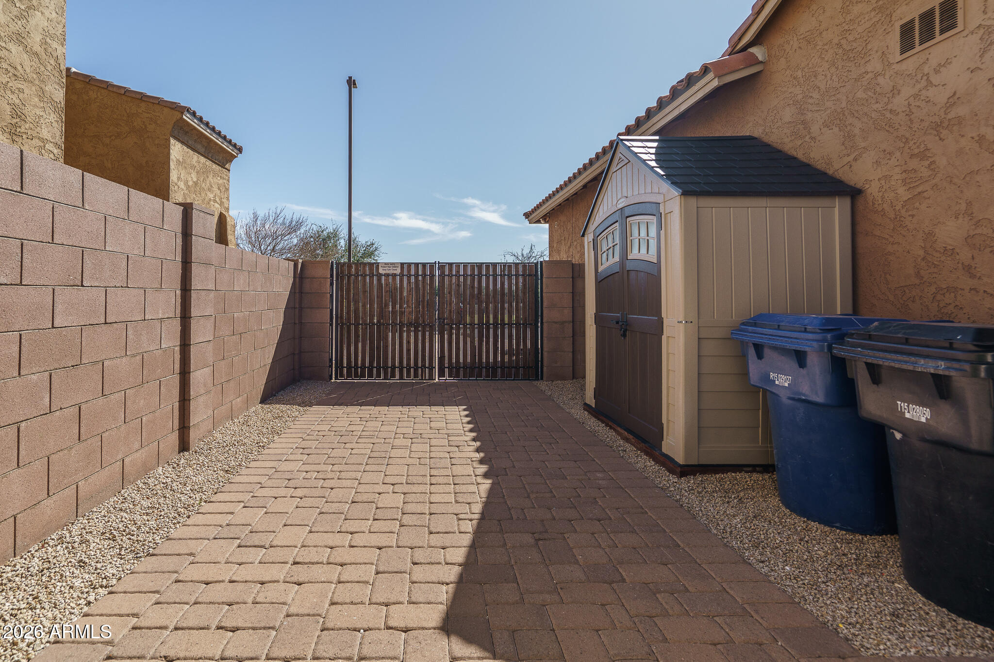 18398 West Rimrock Street Surprise, AZ 85388 - Photo 50 of 65 a view of a house with a backyard