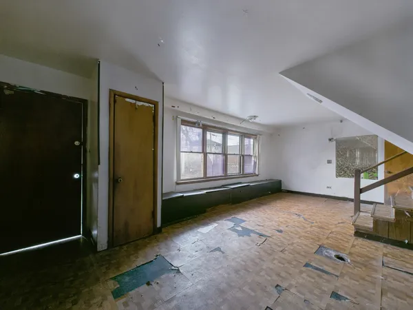 an empty room with windows