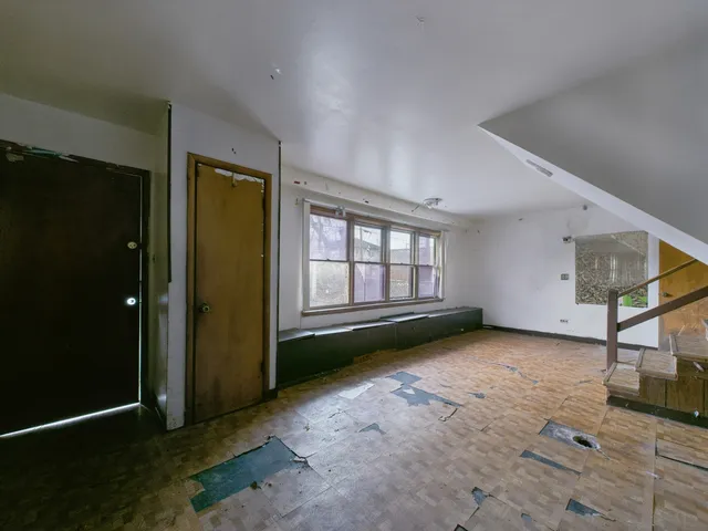an empty room with windows