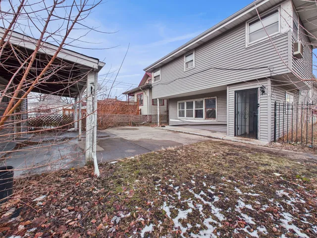 a front view of a house with a garage