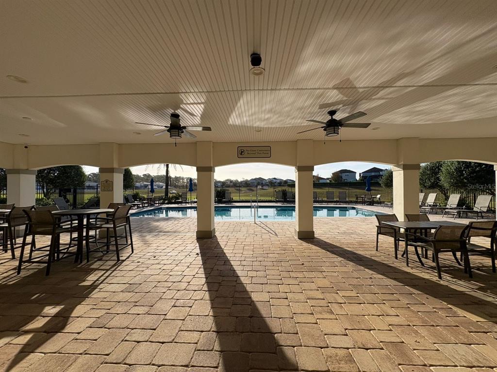 9640 Amber Chestnut Way Winter Garden, FL 34787 - Photo 24 of 32 a view of a patio