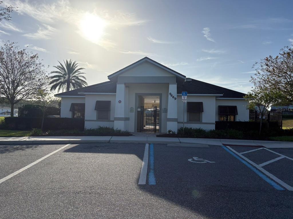 9640 Amber Chestnut Way Winter Garden, FL 34787 - Photo 29 of 32 a front view of a house with yard