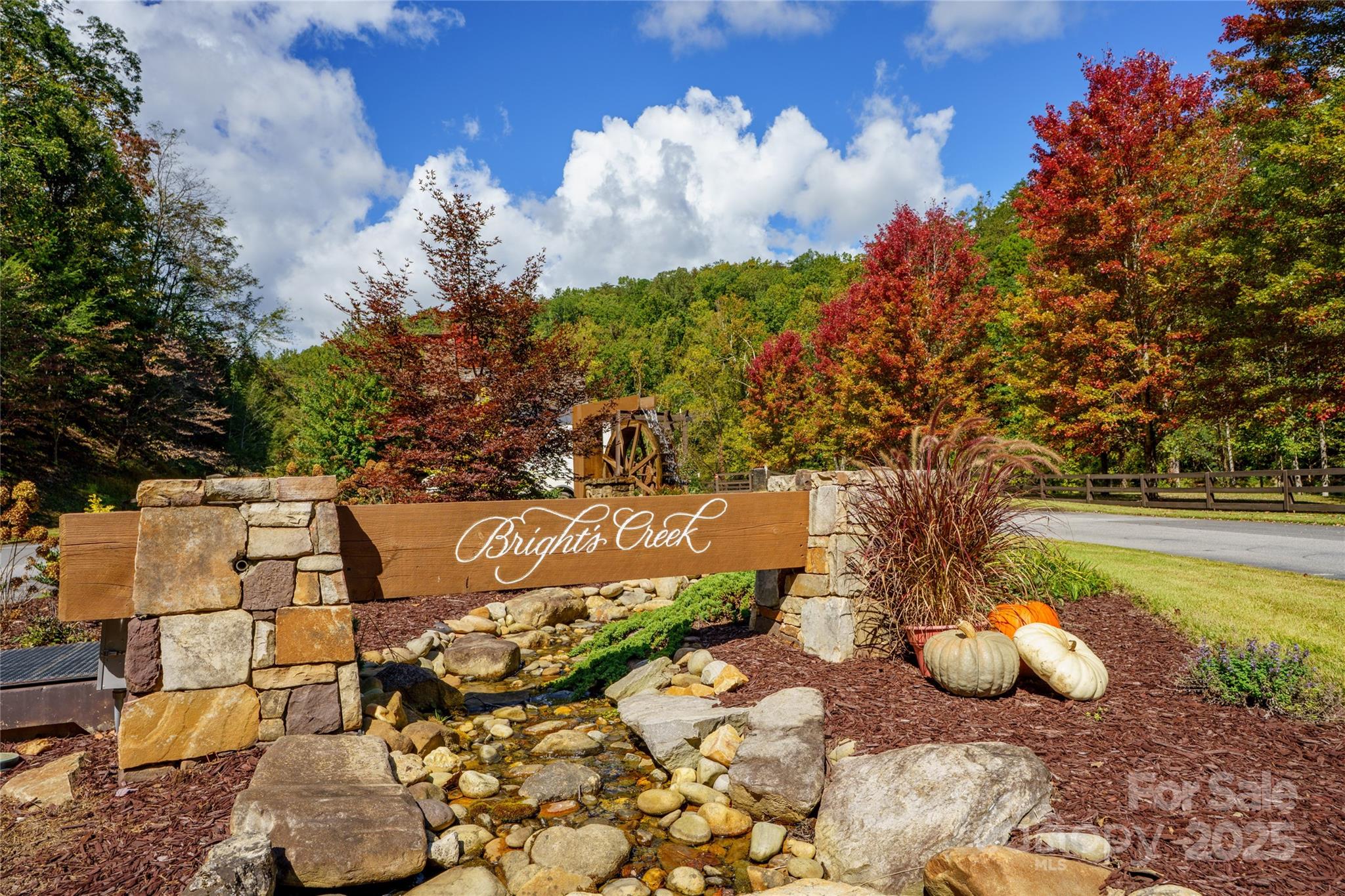 0 Nottingham Drive, Unit 237 Mill Spring, NC 28756 - Photo 14 of 48 a view of a fountain in the backyard of the house
