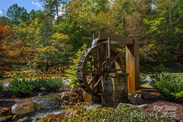 a view of a house with a tree