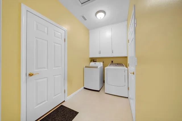 a utility room with a washer and dryer