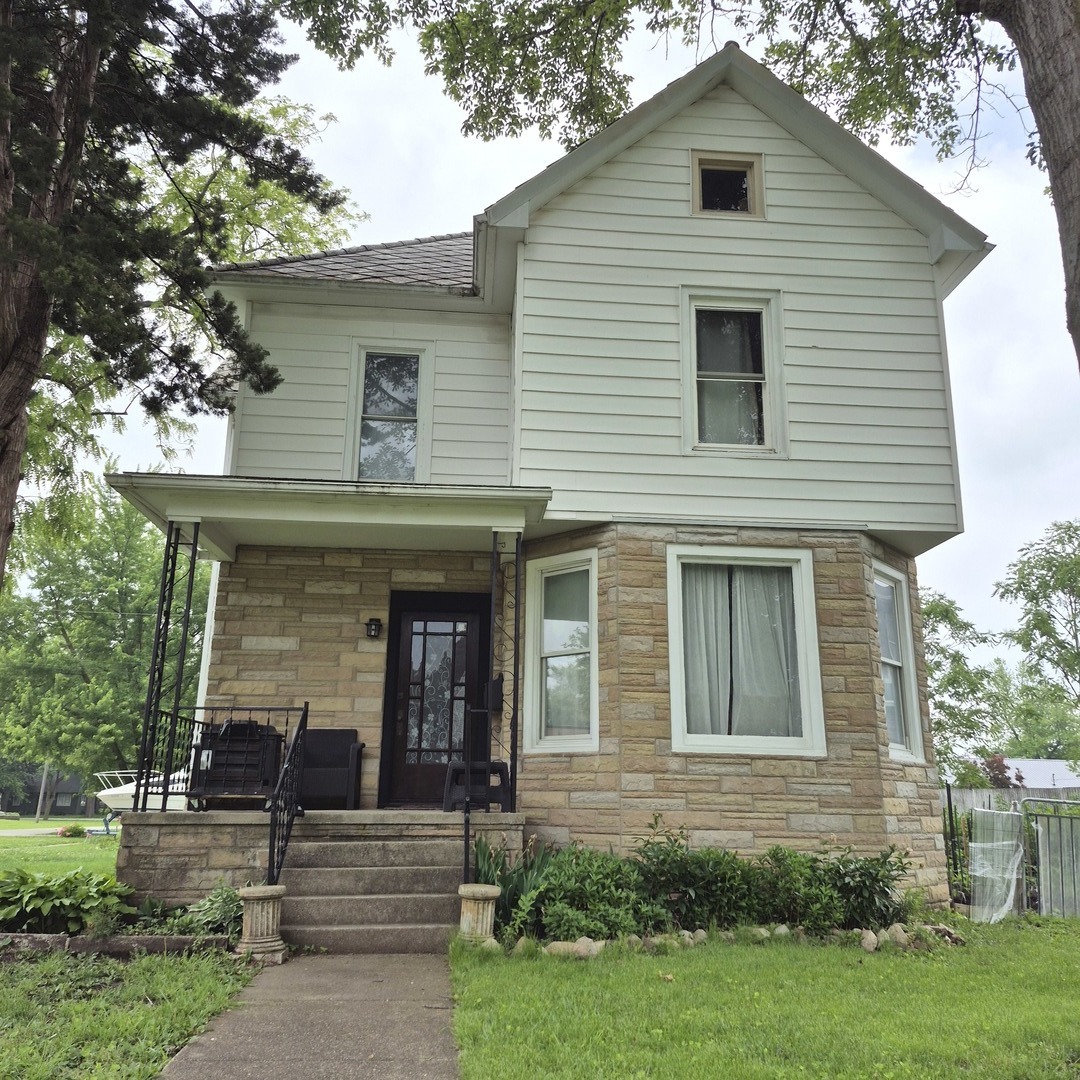 a view of house with outdoor space