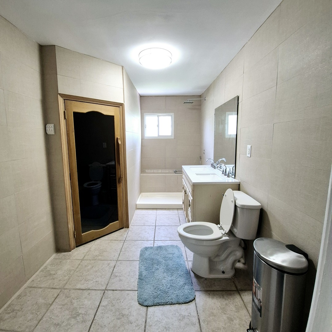 305 East Jackson Street Cullom, IL 60929 - Photo 13 of 23 a bathroom with a toilet and a sink