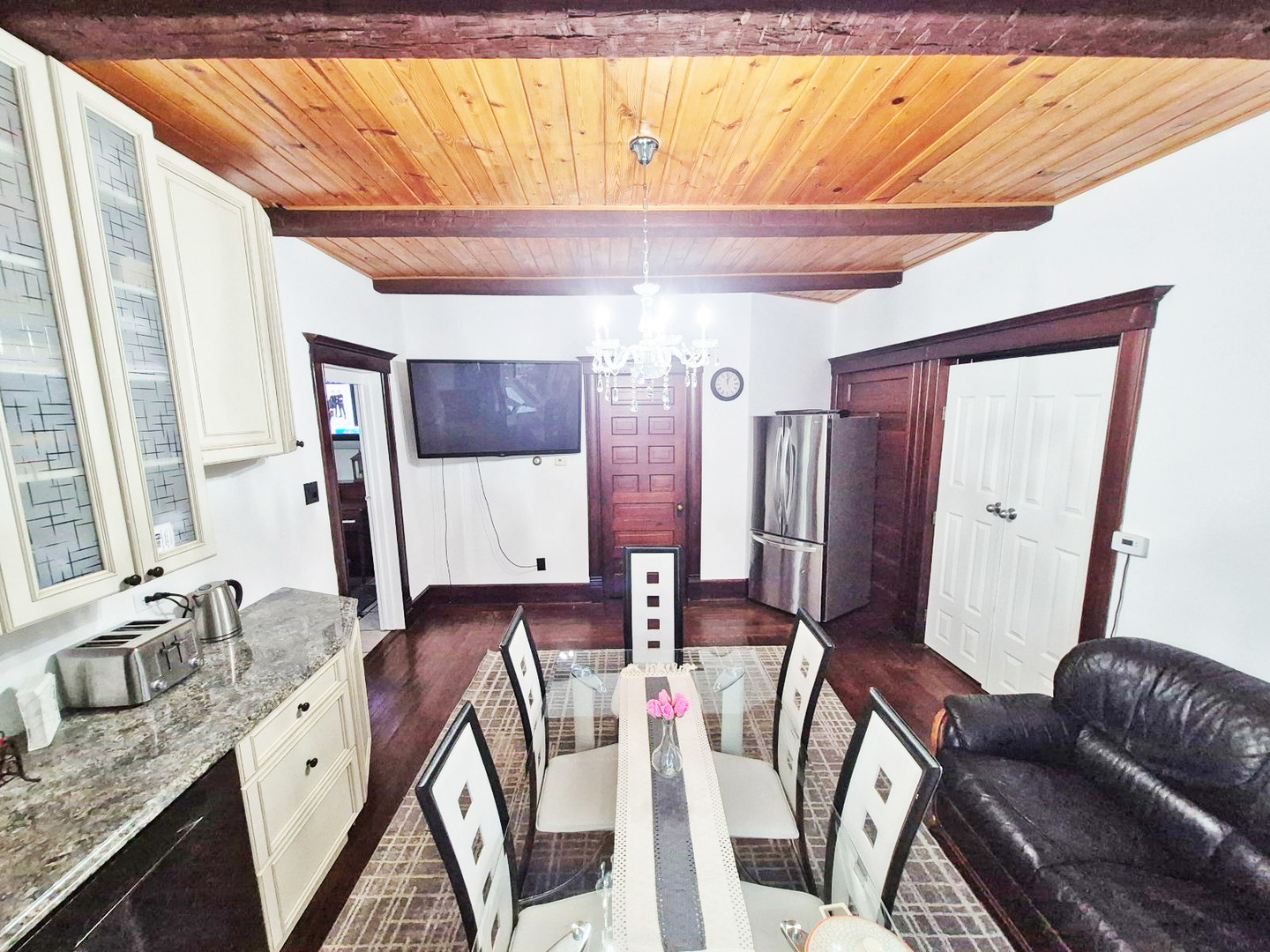 305 East Jackson Street Cullom, IL 60929 - Photo 6 of 23 a en suite bathroom with a granite countertop sink a mirror and shower