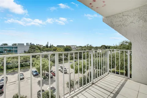 a view of a balcony with lake view and mountain view