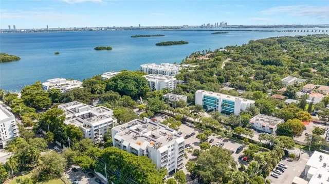 aerial view of a city with lake view
