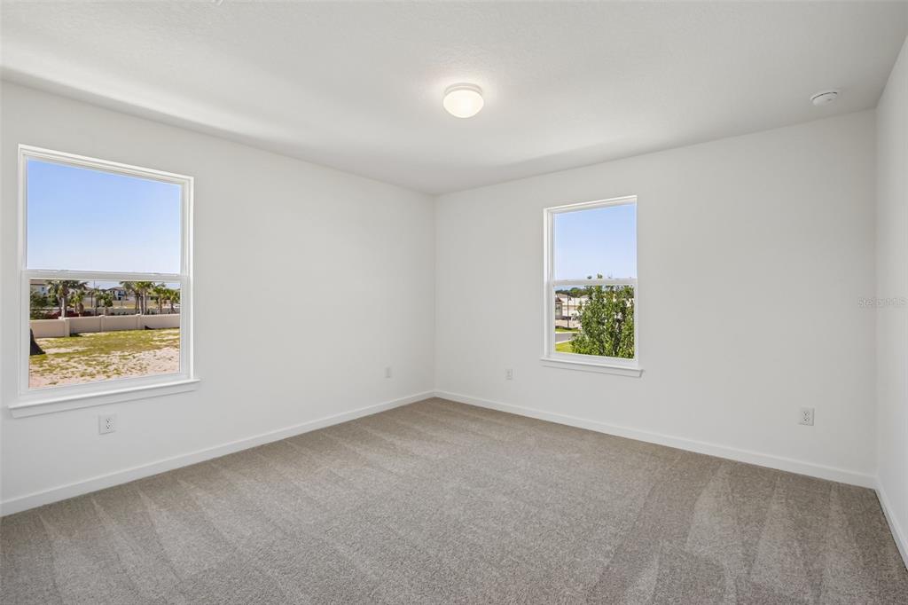 9932 Redwood Rdg Avenue Riverview, FL 33578 - Photo 24 of 38 an empty room with windows