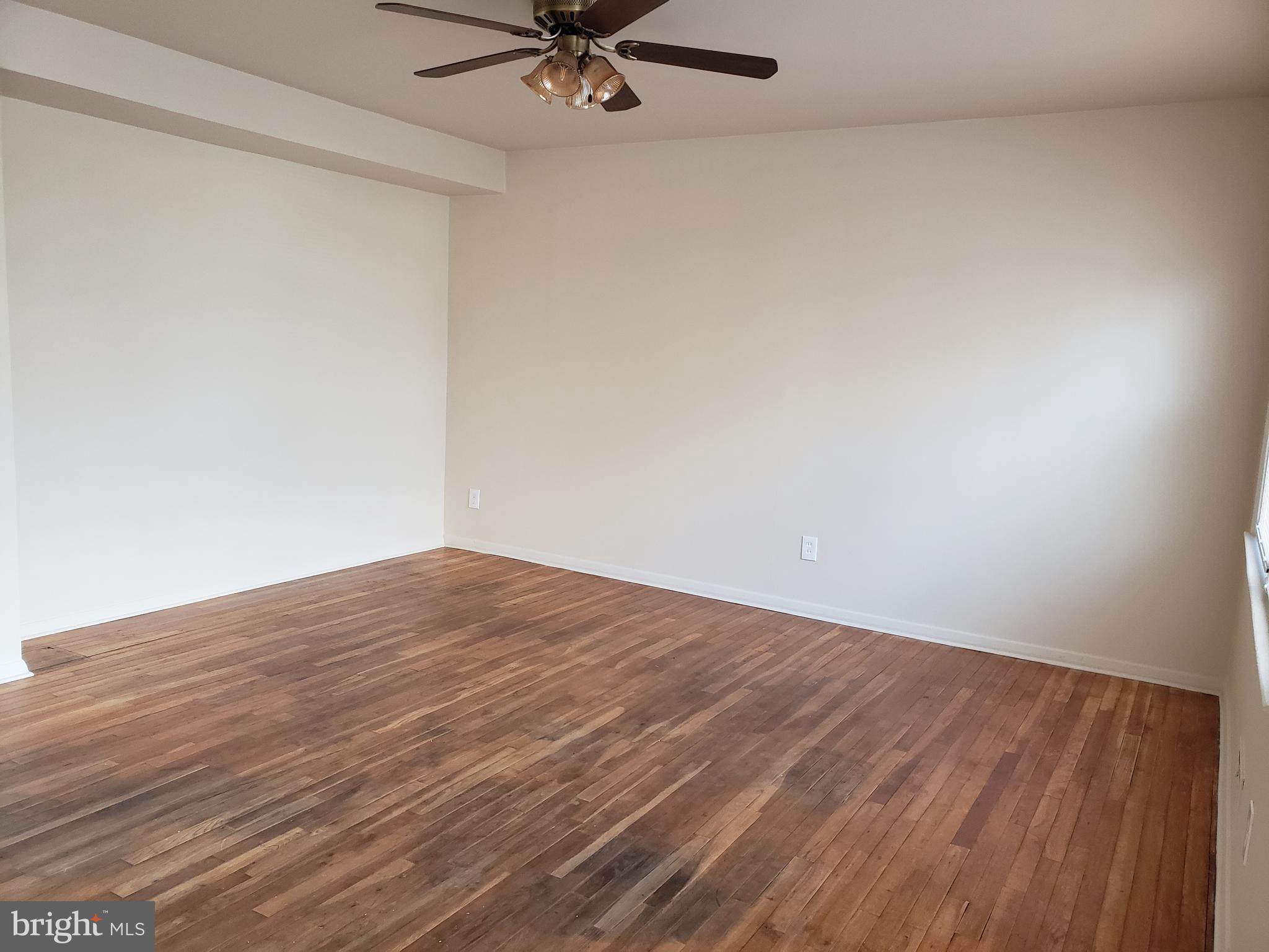 204 Cove Road Essex, MD 21221 - Photo 2 of 14 Living Room With Hardwood Floors