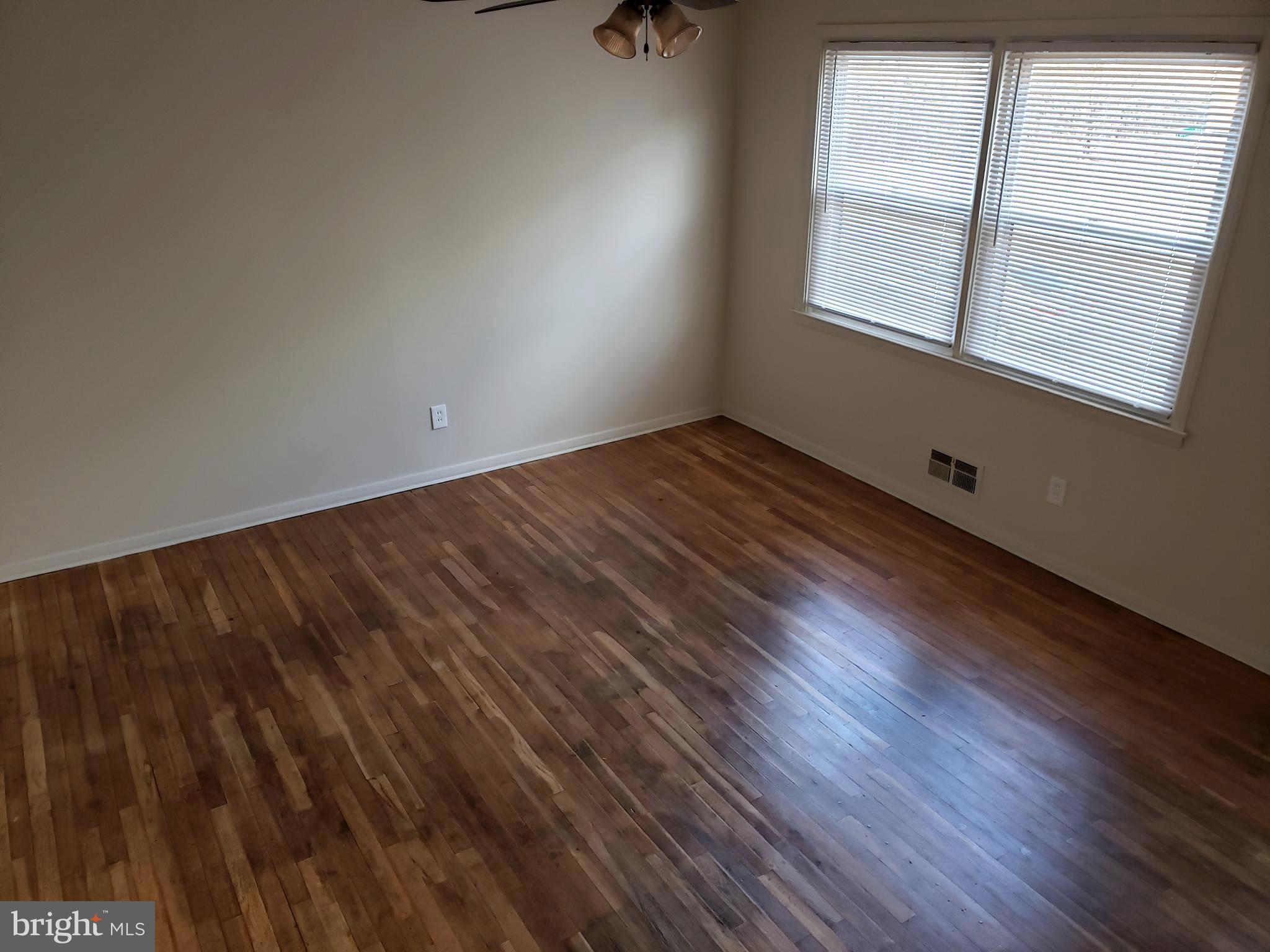 204 Cove Road Essex, MD 21221 - Photo 3 of 14 Living Room With Hardwood Floors
