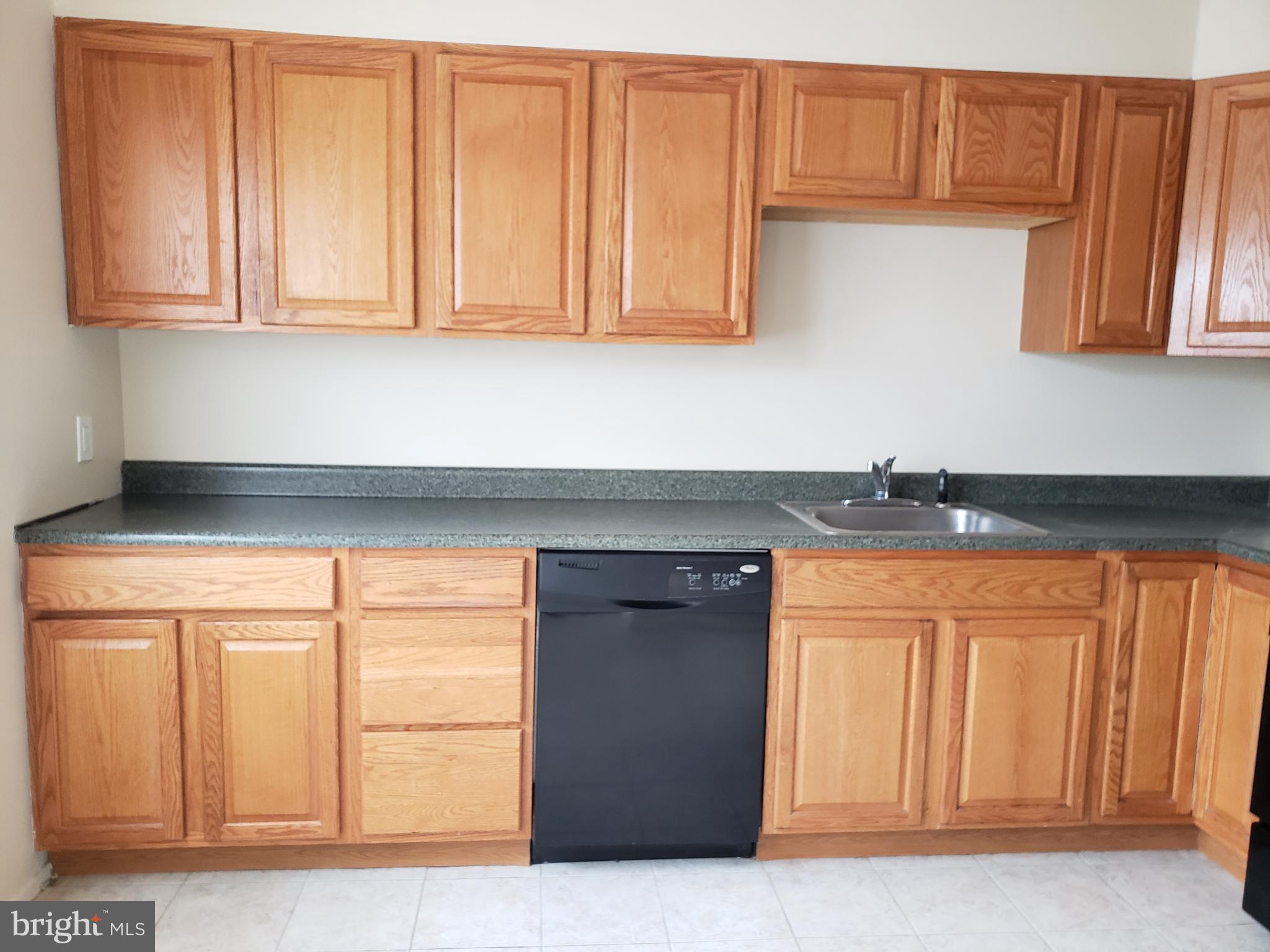 204 Cove Road Essex, MD 21221 - Photo 6 of 14 Spacious Kitchen With Ceramic Tile