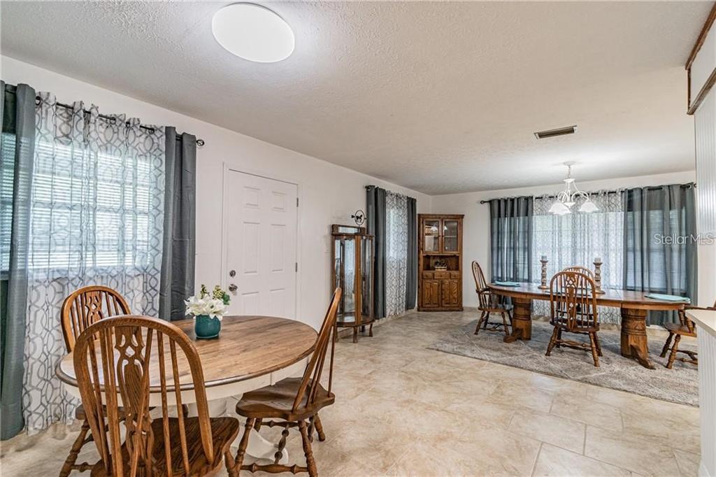1453 Creek Road Wesley Chapel, FL 33543 - Photo 12 of 26 a view of a livingroom with furniture