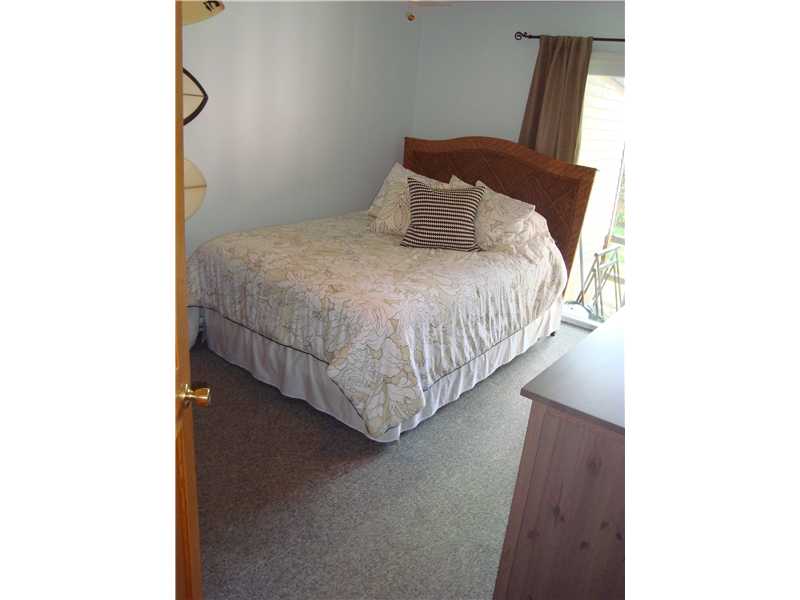 908 Boston Neck Road, Unit 25 Narragansett, RI 02882 - Photo 4 of 9 Bedroom. Sliders off the bedroom to the large patio