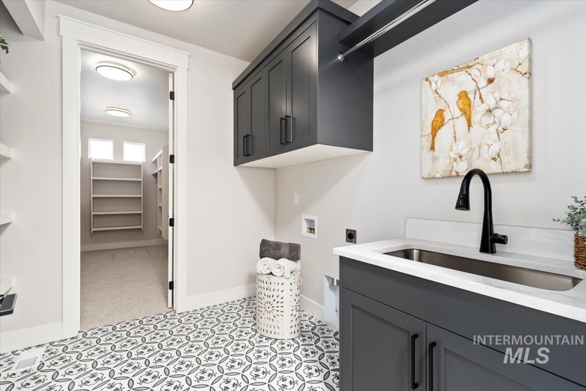 357 West Flour Mill Middleton, ID 83644 - Photo 29 of 49 Laundry area featuring cabinet space, hookup for an electric dryer, and hookup for a washing machine