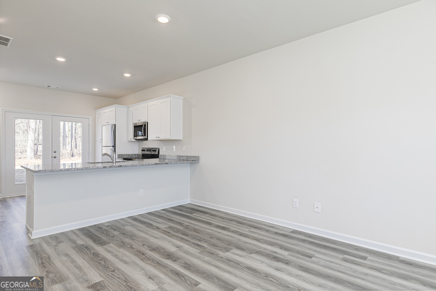 214 Rooker Drive LaGrange, GA 30241 - Photo 7 of 15 a view of kitchen with wooden floor