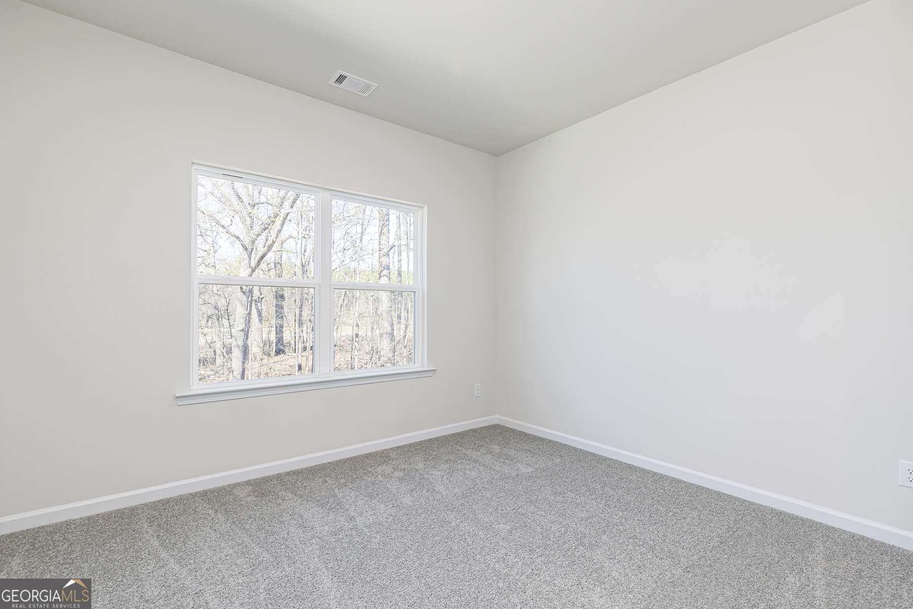 214 Rooker Drive LaGrange, GA 30241 - Photo 9 of 15 an empty room with a window