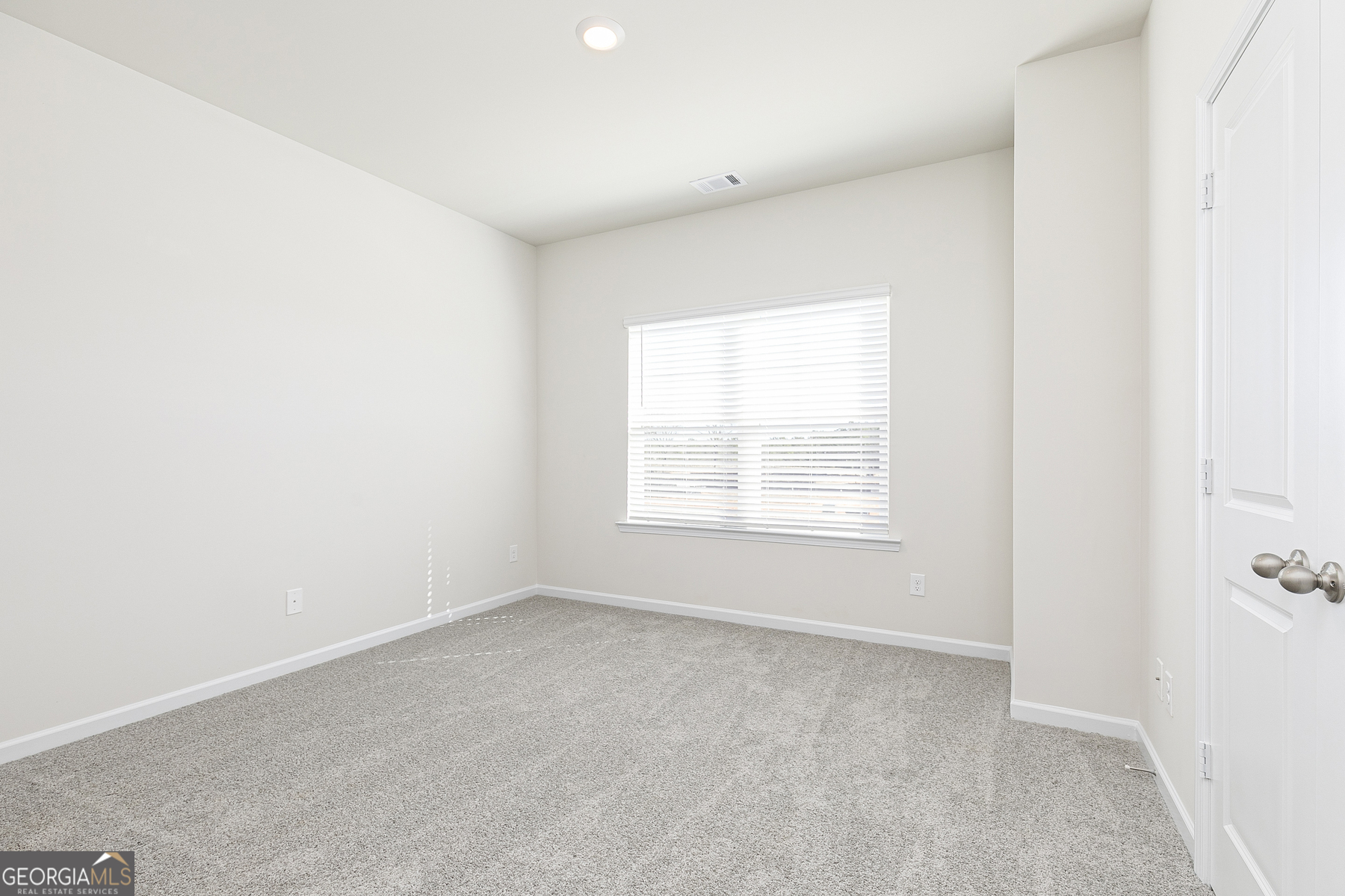 214 Rooker Drive LaGrange, GA 30241 - Photo 10 of 15 an empty room with a window
