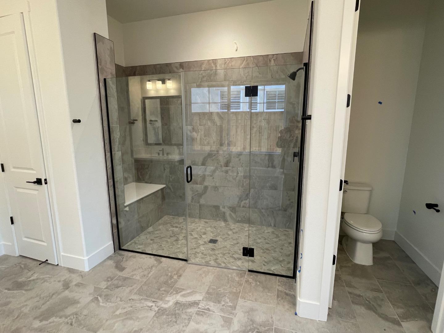 483 Russell Way Marina, CA 93933 - Photo 7 of 7 a bathroom with a shower a toilet and a sink