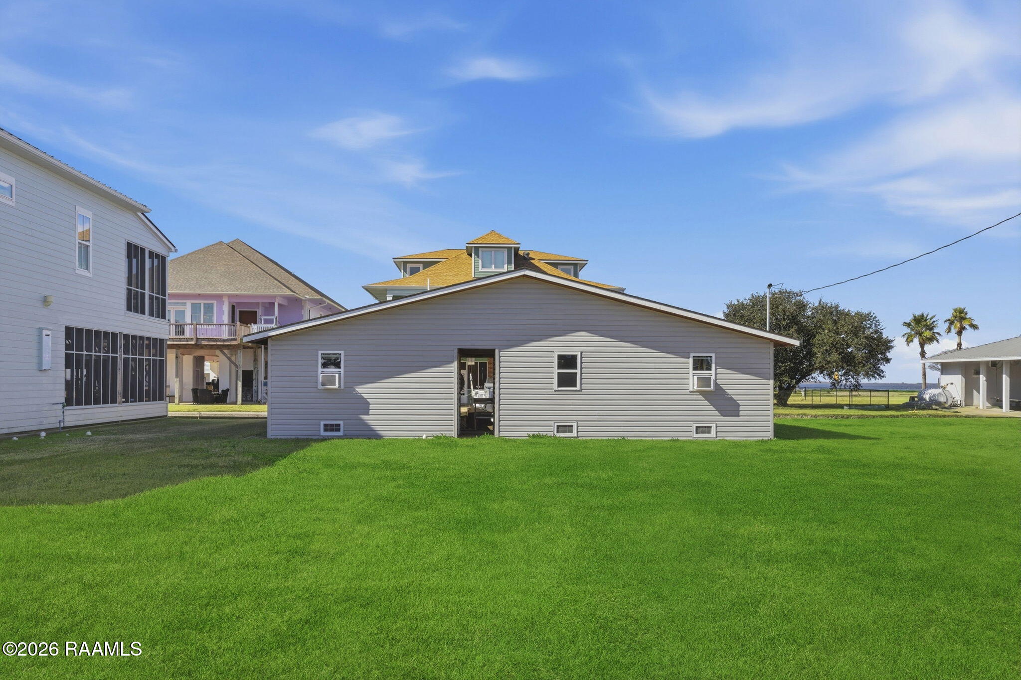 133 Pelican Lane Lake Charles, LA 70607 - Photo 29 of 36 29-web-or-mls-HC6A0153_grass_5e308136-a0