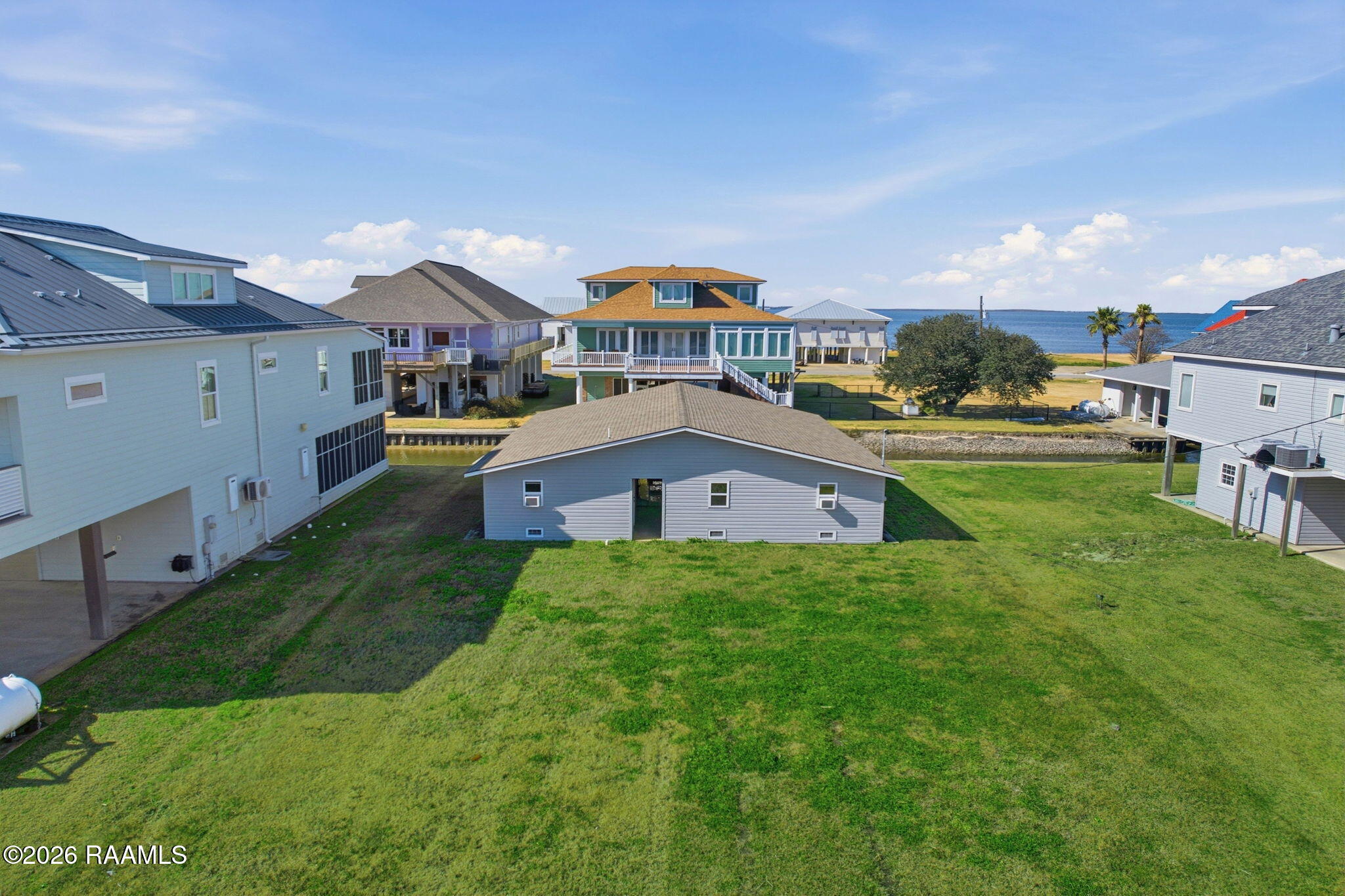 133 Pelican Lane Lake Charles, LA 70607 - Photo 30 of 36 30-web-or-mls-DJI_0520_grass_a8452863-89
