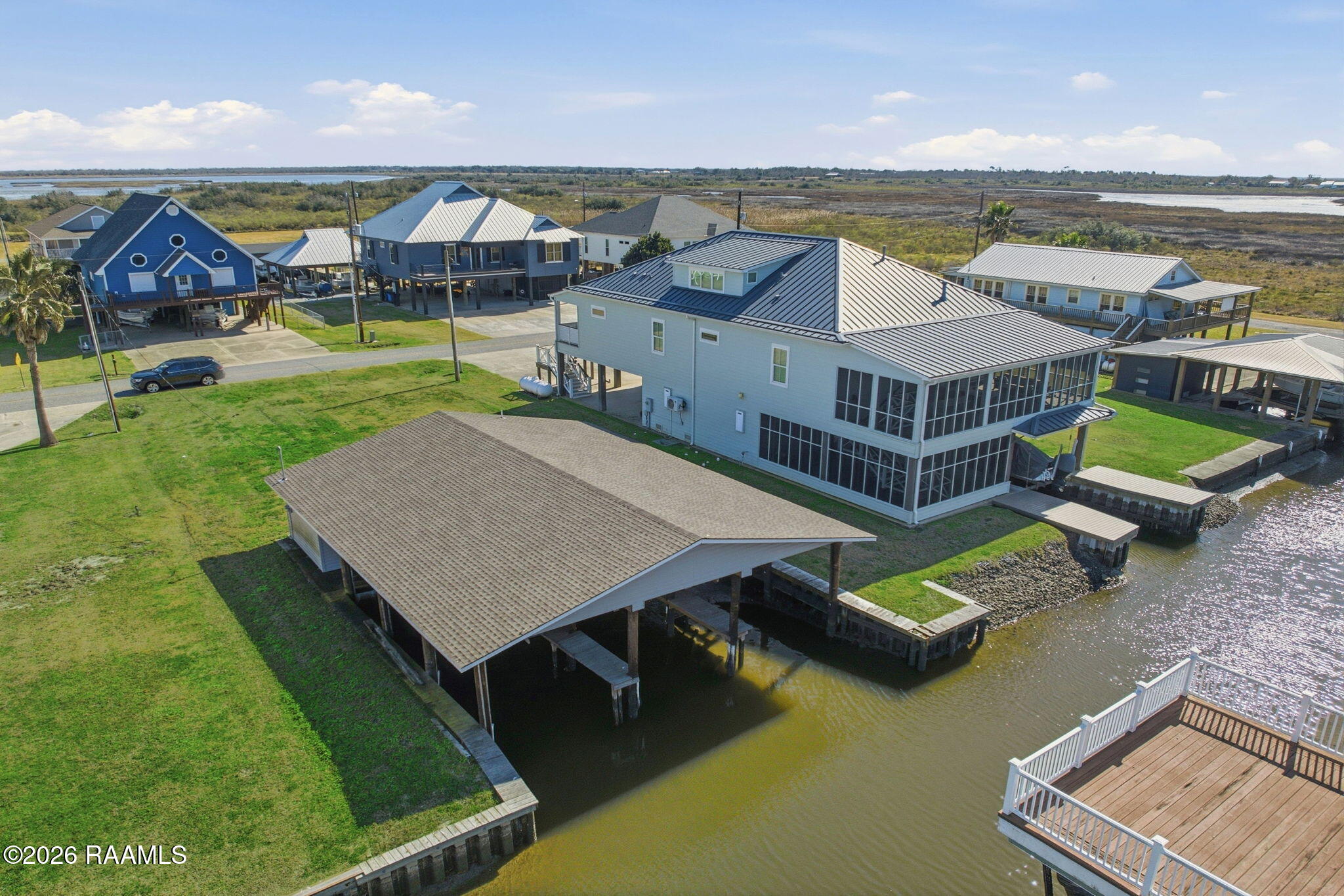 133 Pelican Lane Lake Charles, LA 70607 - Photo 32 of 36 32-web-or-mls-DJI_0525_grass_4cffe178-a3