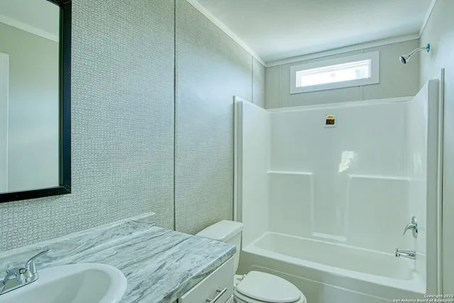 a view of backyard with tree