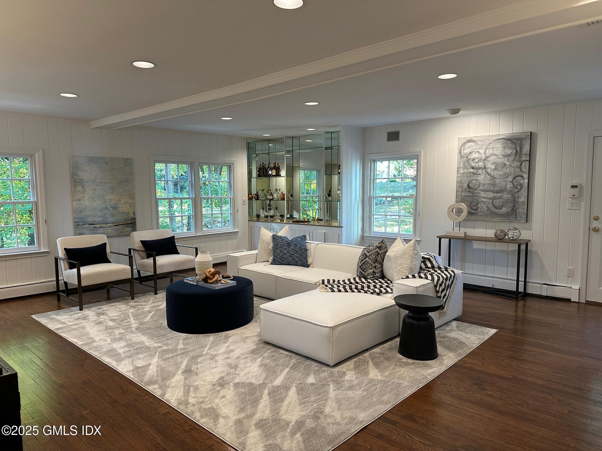 8 Tinker Lane Greenwich, CT 06830 - Photo 14 of 41 a living room with furniture and a large window