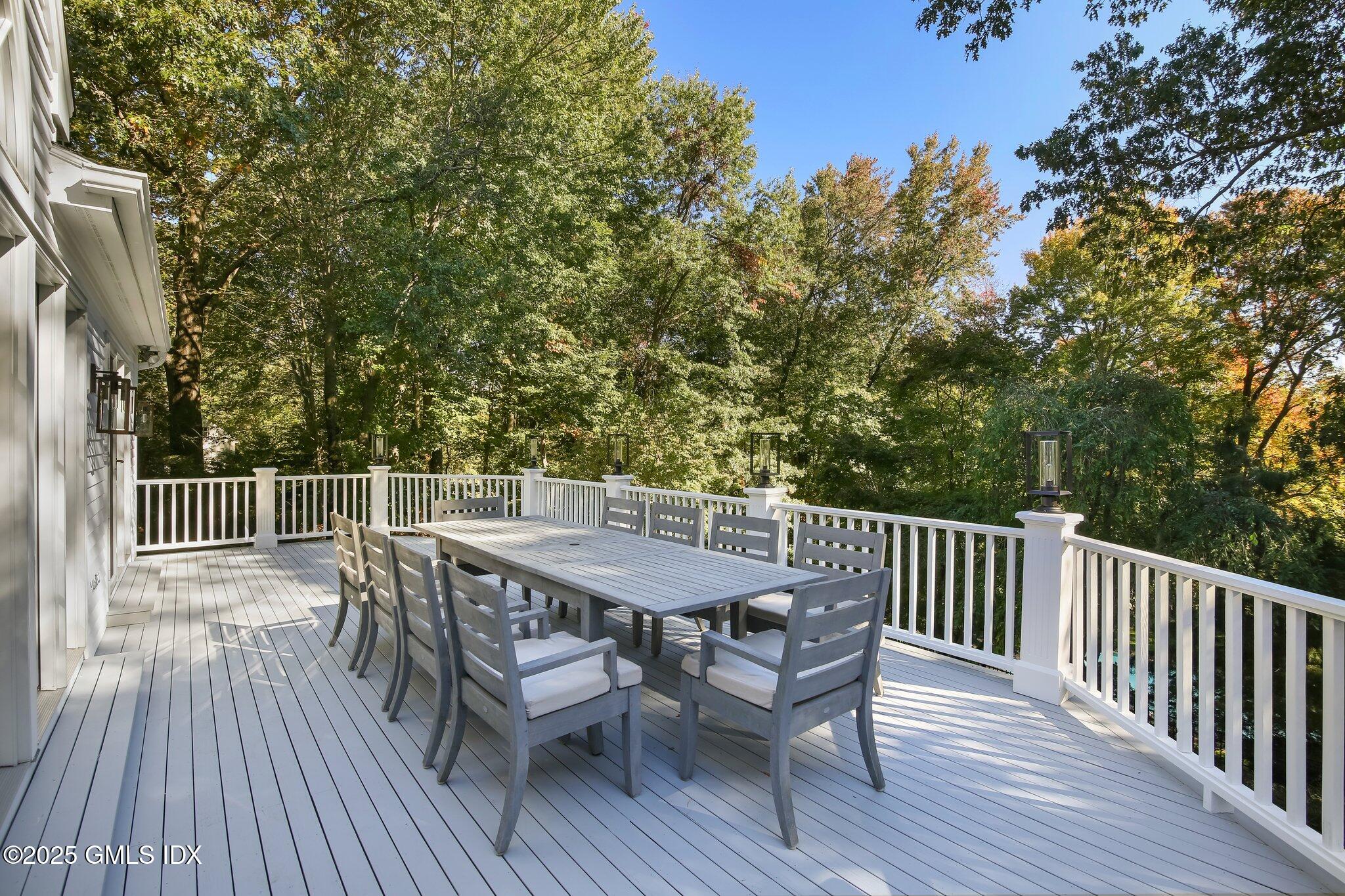 8 Tinker Lane Greenwich, CT 06830 - Photo 32 of 41 a view of a deck patio and outdoor seating