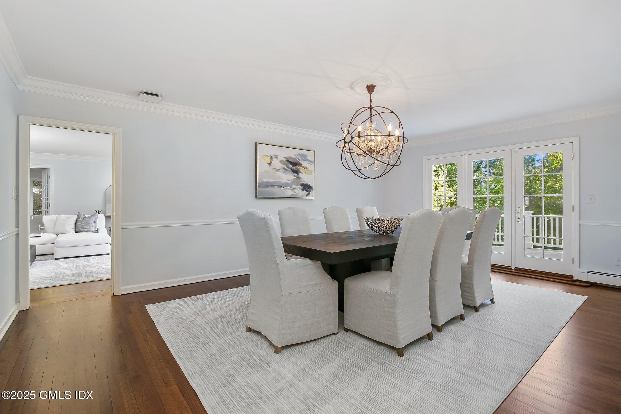 8 Tinker Lane Greenwich, CT 06830 - Photo 7 of 41 a living room with couch and a table