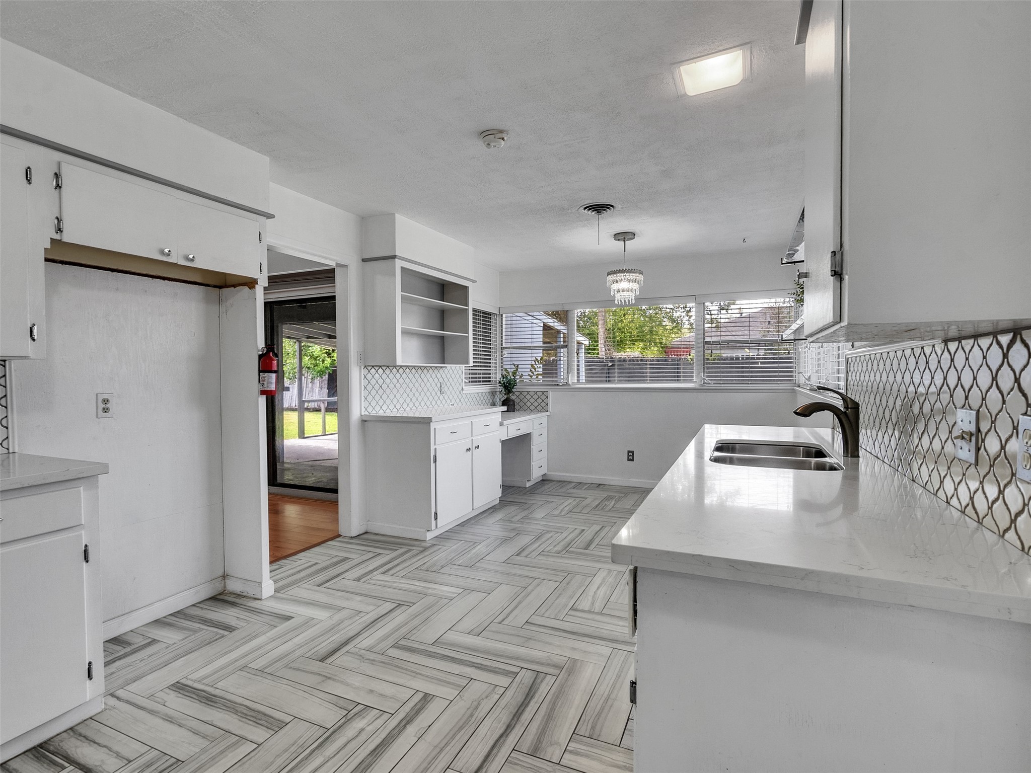 2011 Durrain Ferry Road Baytown, TX 77520 - Photo 12 of 32 Bright kitchen with adjoining breakfast area.