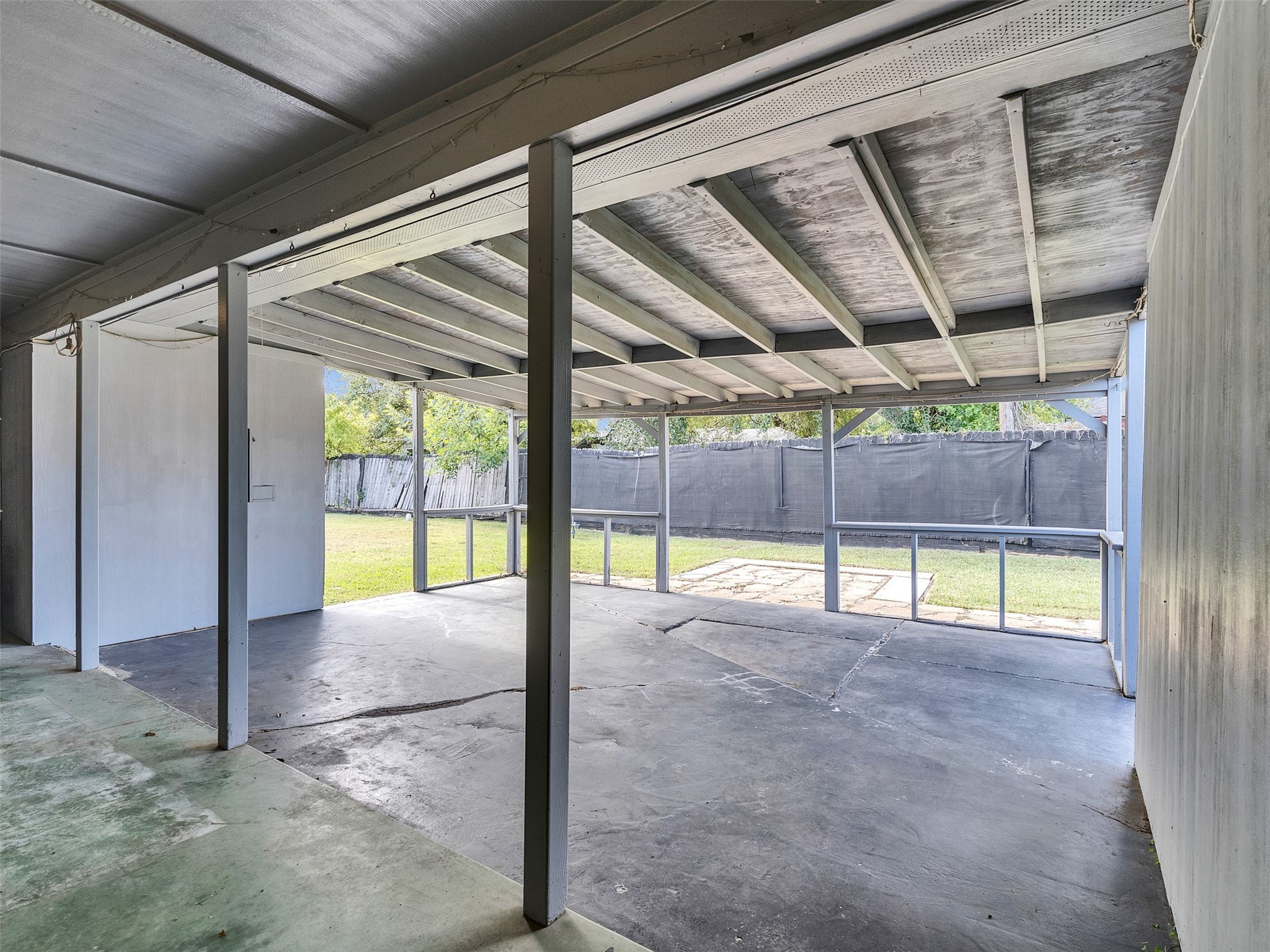 2011 Durrain Ferry Road Baytown, TX 77520 - Photo 8 of 32 Gather, relax, and make memories under the perfect patio cover.