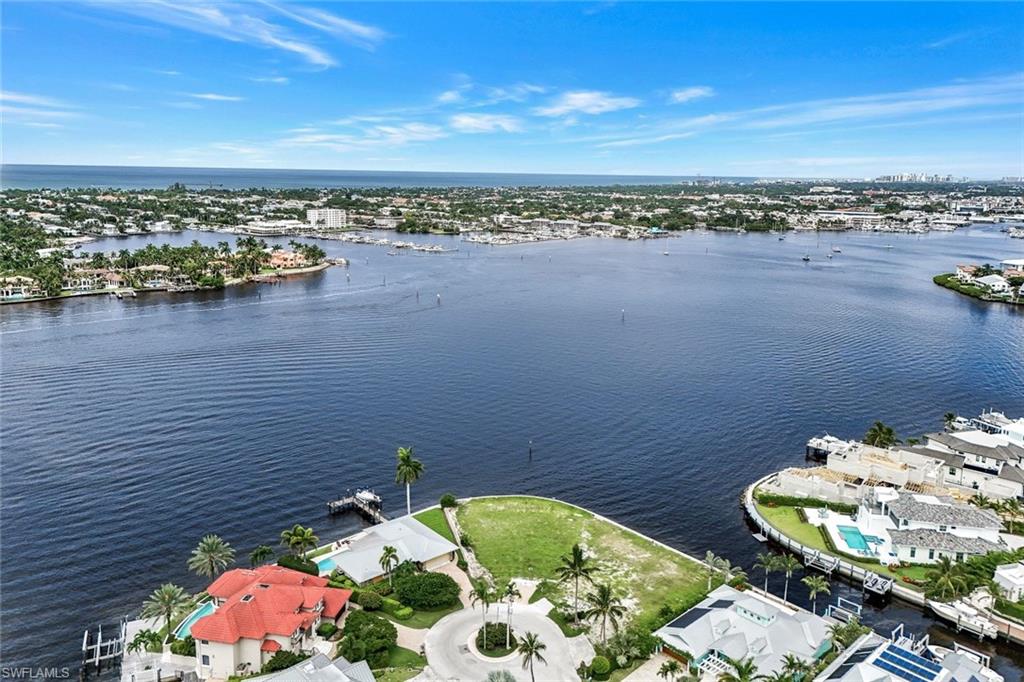 1303 Marlin Drive Naples, FL 34102 - Photo 10 of 15 Drone / aerial view featuring a water view