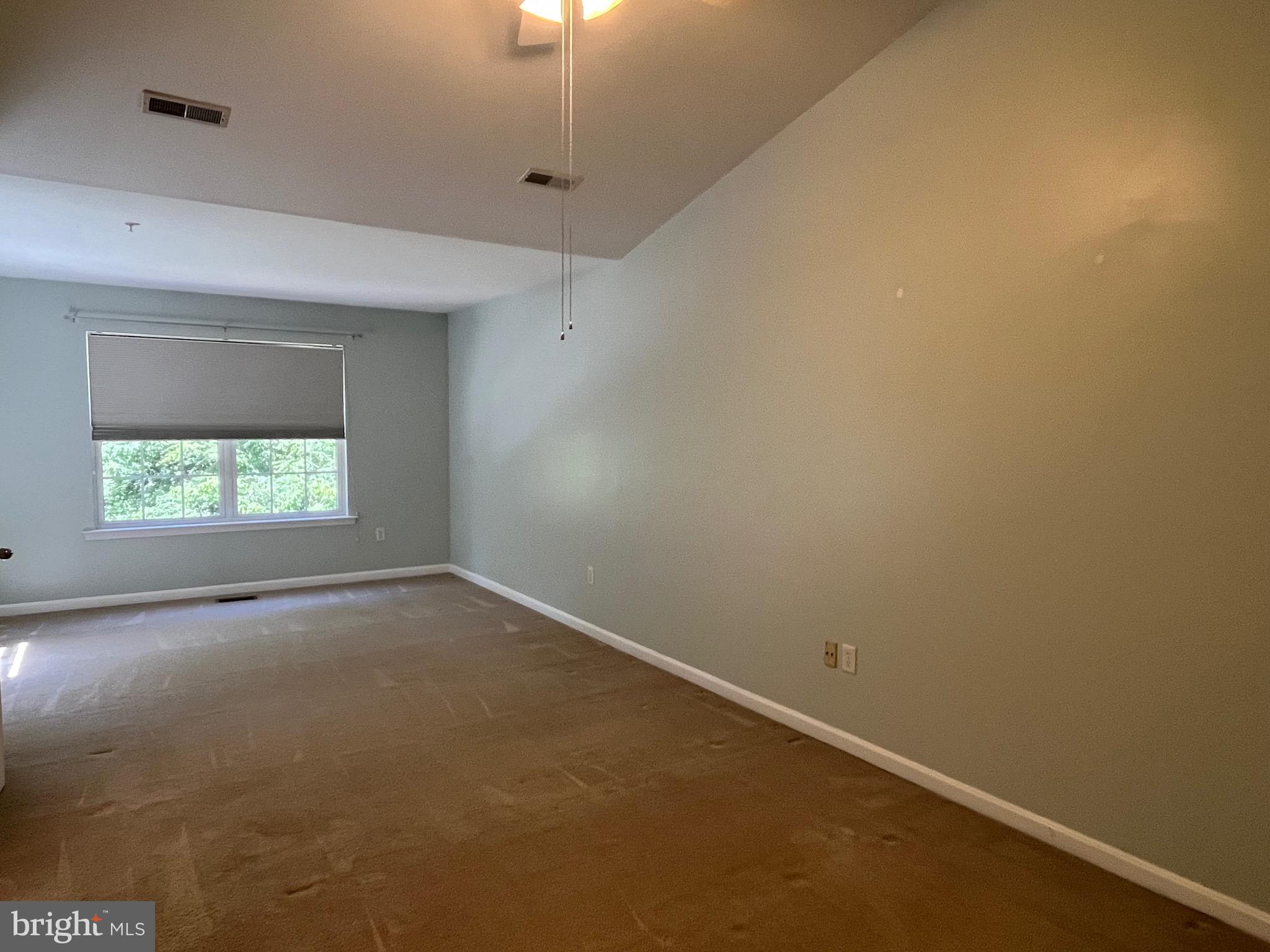 704 Shallow Ridge Court Abingdon, MD 21009 - Photo 18 of 43 Primary bedroom with vaulted ceiling