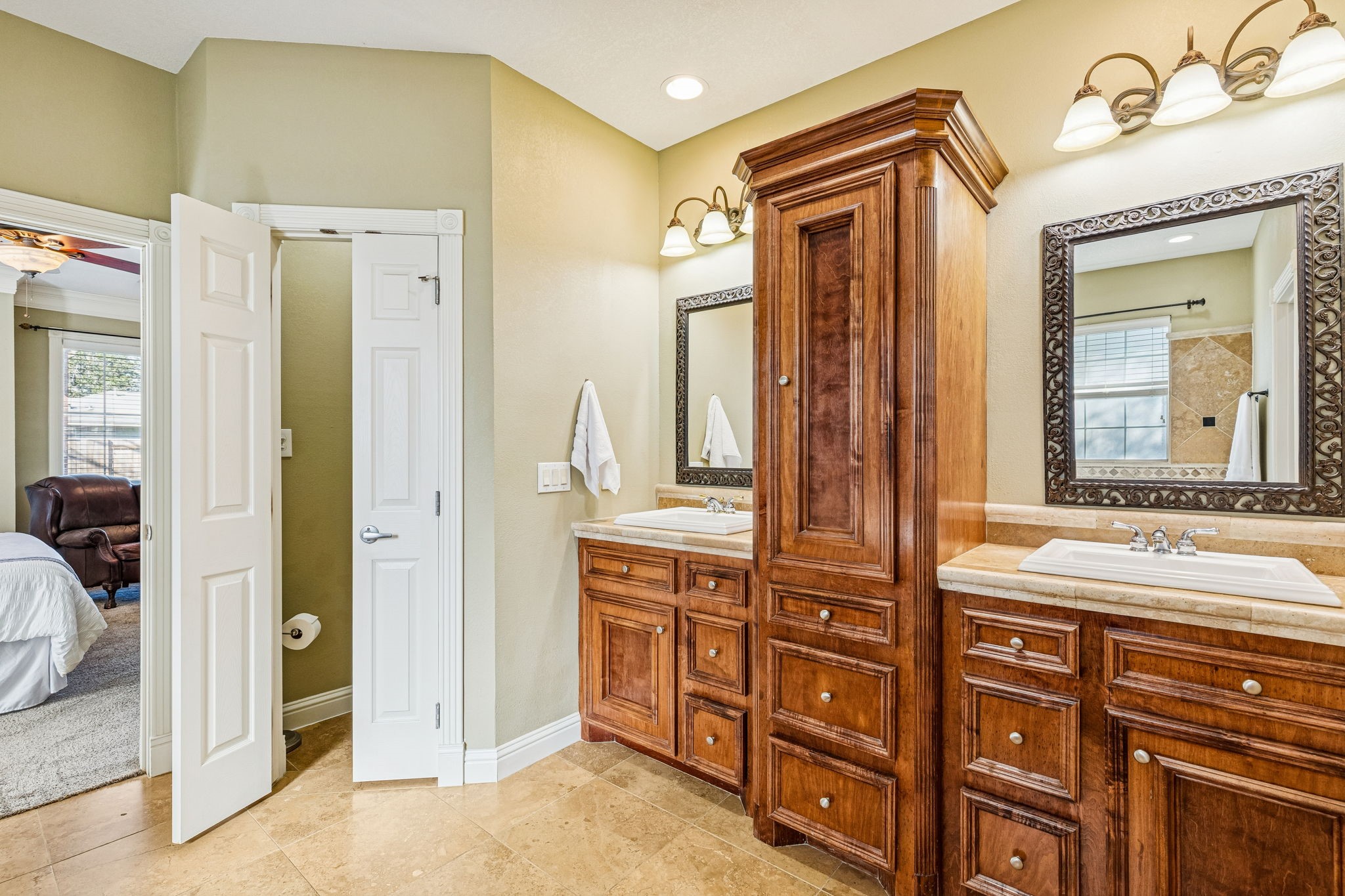 2217 Bernie Avenue Rosenberg, TX 77471 - Photo 11 of 25 The spa-like en-suite features double sinks with granite counters, a jetted tub, and a separate walk-in shower.