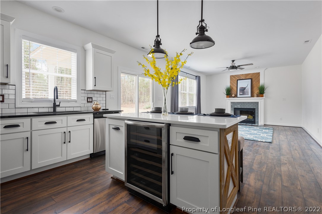 15581 Raccoon Run Road Wagram, NC 28396 - Photo 15 of 30 a kitchen with a sink cabinets and window