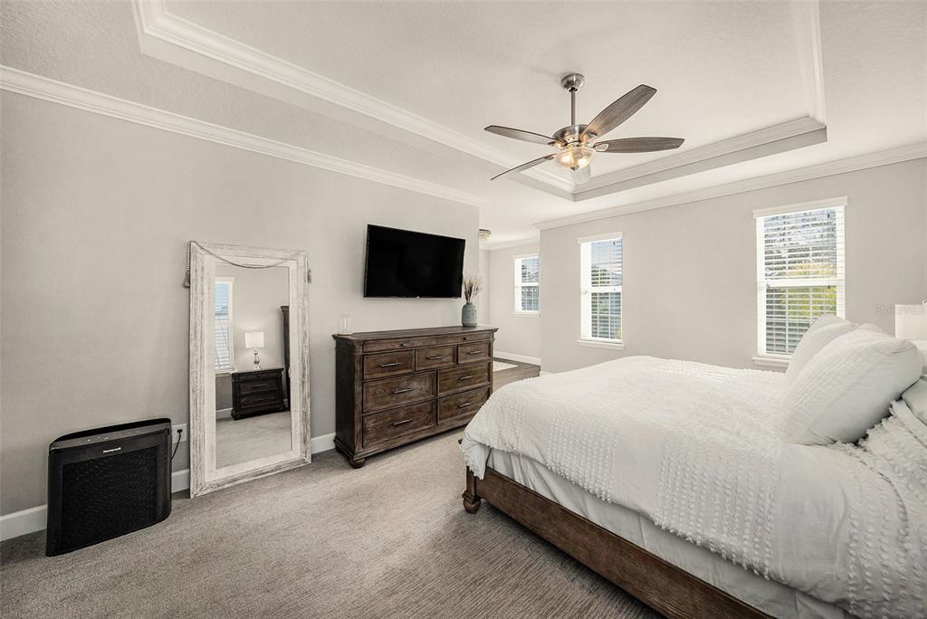 6412 Key Island Boulevard Apollo Beach, FL 33572 - Photo 18 of 42 a bedroom with a bed and a television