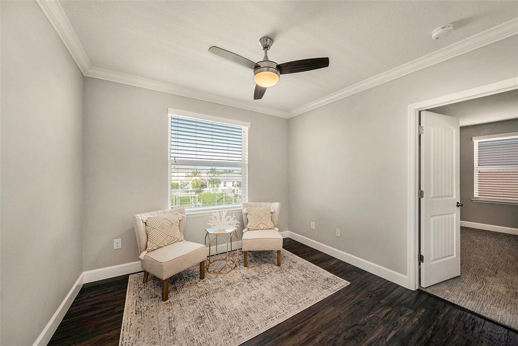 6412 Key Island Boulevard Apollo Beach, FL 33572 - Photo 20 of 42 a living room with furniture and a window