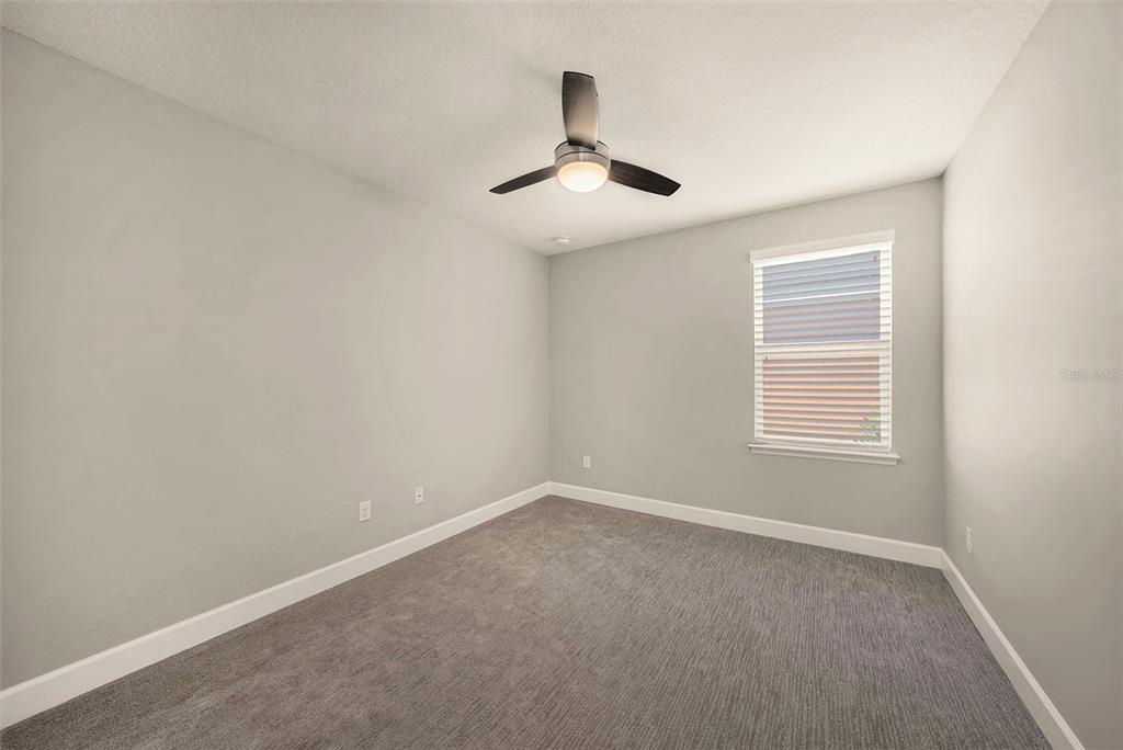 6412 Key Island Boulevard Apollo Beach, FL 33572 - Photo 22 of 42 a view of an empty room with a window