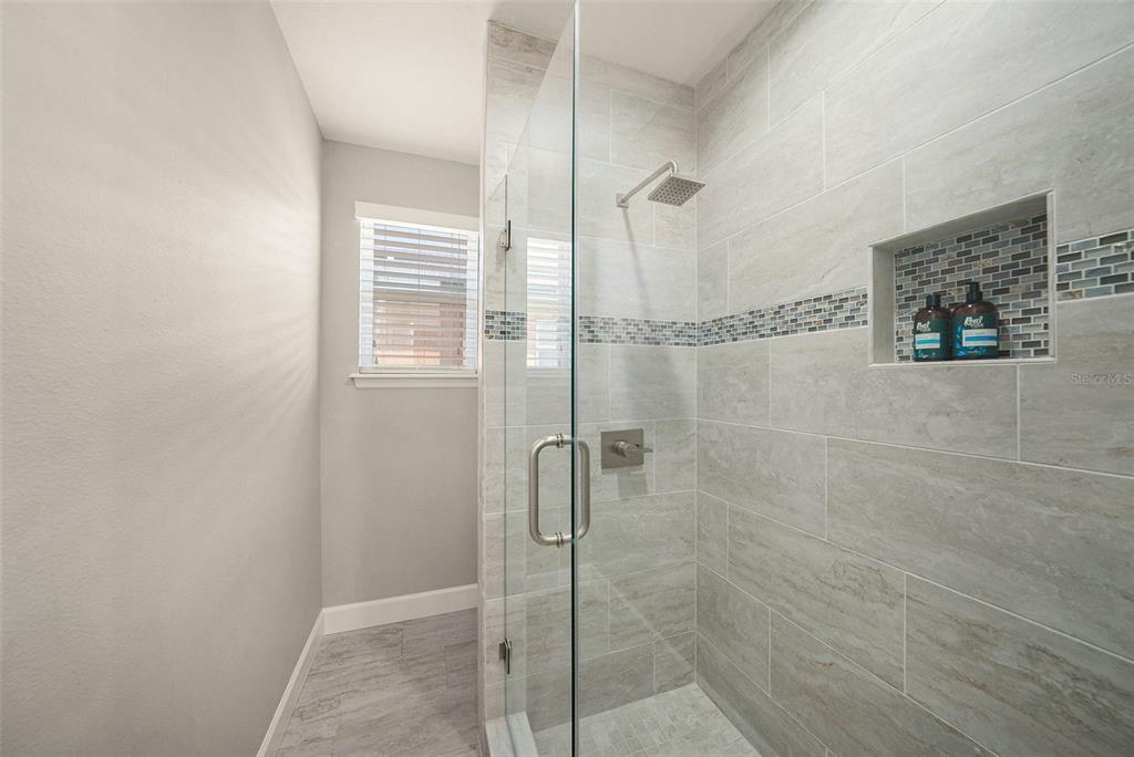 6412 Key Island Boulevard Apollo Beach, FL 33572 - Photo 24 of 42 a bathroom with a shower