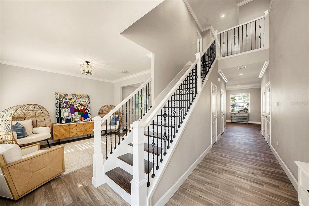 6412 Key Island Boulevard Apollo Beach, FL 33572 - Photo 3 of 42 a view of entryway and hall with wooden floor