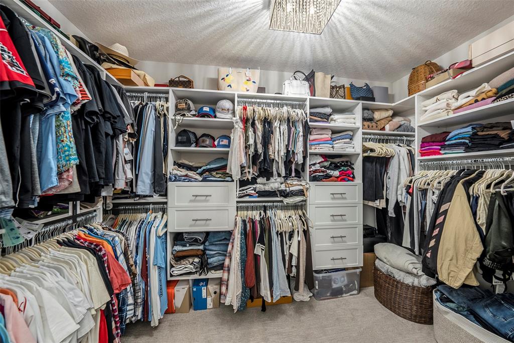 6412 Key Island Boulevard Apollo Beach, FL 33572 - Photo 31 of 42 a view of walk in closet with clothes and shoes