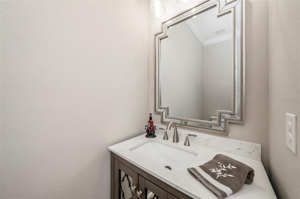 6412 Key Island Boulevard Apollo Beach, FL 33572 - Photo 32 of 42 a bathroom with a sink vanity and a mirror
