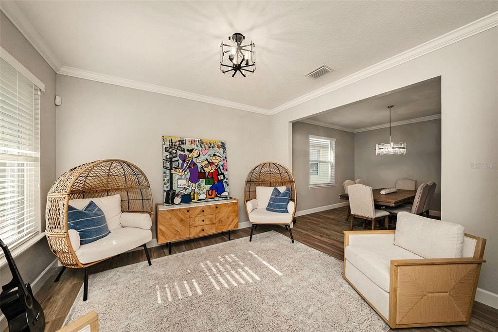 6412 Key Island Boulevard Apollo Beach, FL 33572 - Photo 4 of 42 a living room with furniture and a window