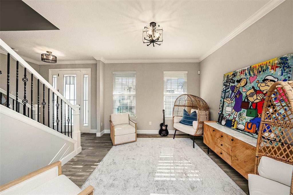 6412 Key Island Boulevard Apollo Beach, FL 33572 - Photo 5 of 42 a bed room with a bed and a couch