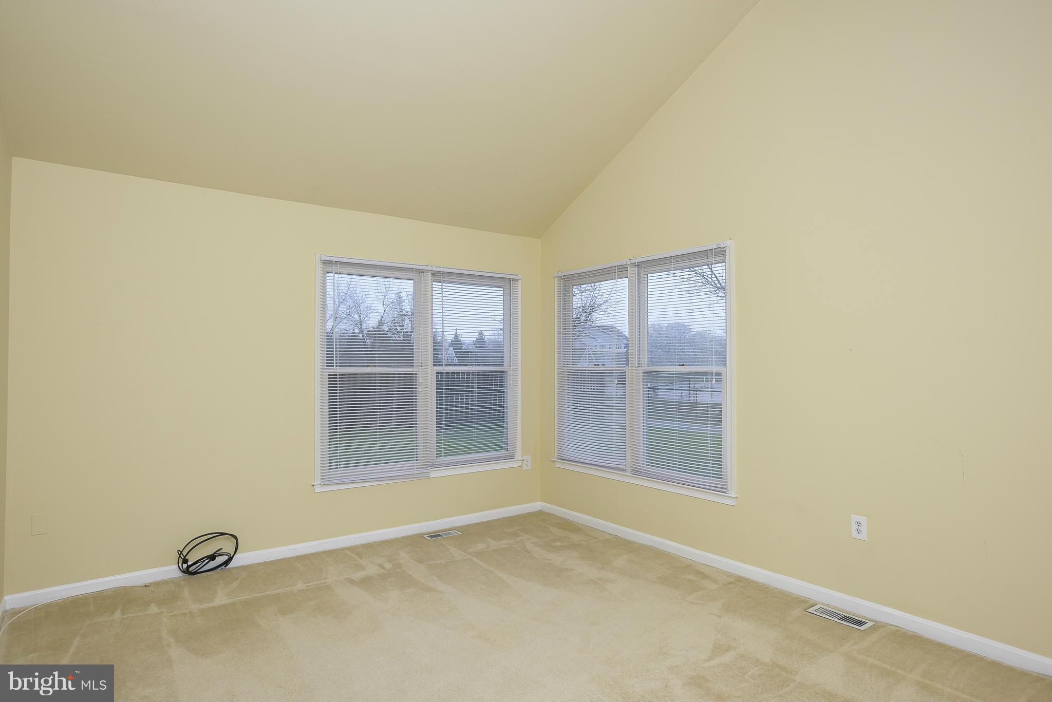 14243 Greenview Drive Laurel, MD 20708 - Photo 12 of 26 an empty room with windows