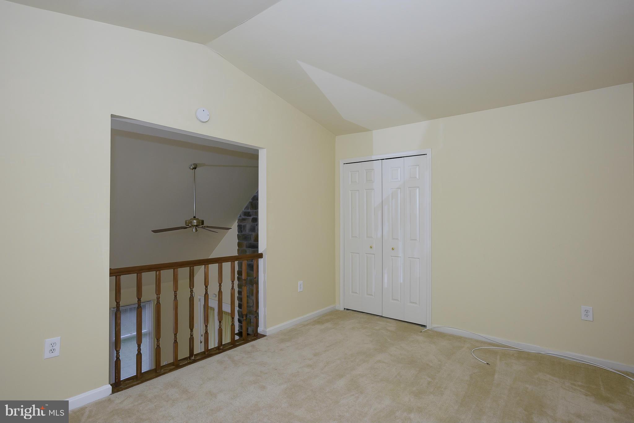 14243 Greenview Drive Laurel, MD 20708 - Photo 20 of 26 a view of a hallway with a door